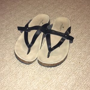 Black slip on sandals
